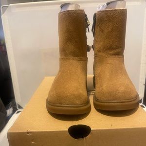 Slightly worn Ugg riding boots